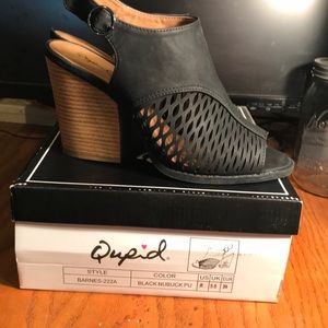 Black and brown buckle heels